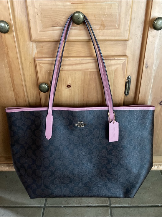 Coach Handbags - Coach Brown Signature Tote with Pink Trim and Straps